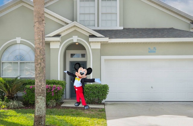 Luxury Stay Near Disney Private Pool Hot Tub & EV Charger at Blissful Blue Oasis