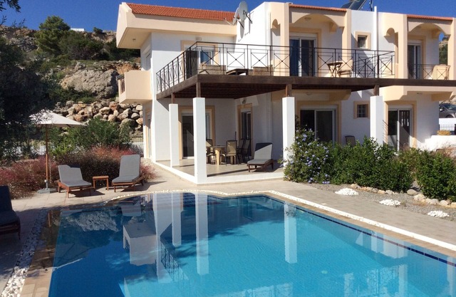 Luxury Villa. Overlooks Tsampika Beach. Large private pool. 4 bedrooms.