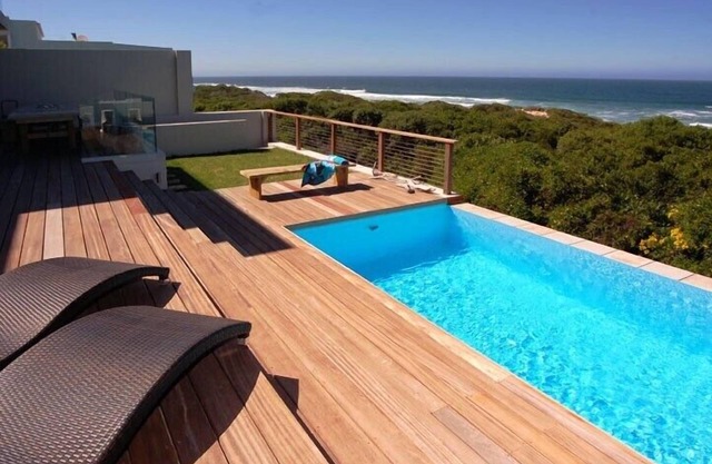 Magnificent luxury beachfront home with private beach access & Solar back up.
