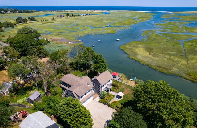 Magnificent views of tidal creek from all rooms. Large home has a dock and plenty of space.