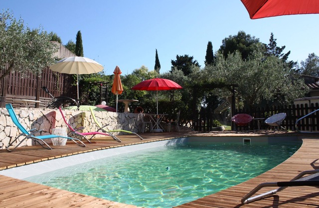 Magnificent villa with heated pool, breathtaking view amid olive trees.