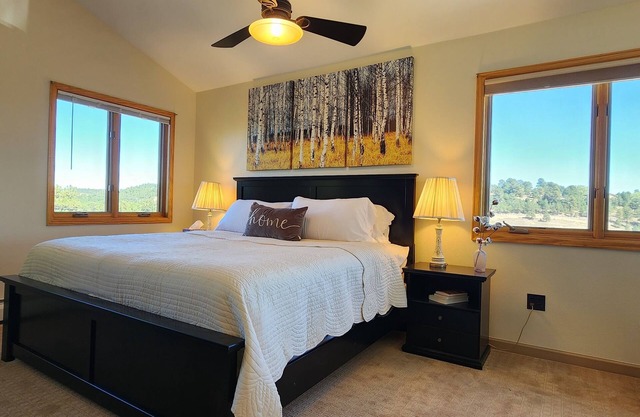 Main floor master, gourmet kitchen, and Hot tub with amazing mountain views