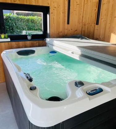 Maison Gite Chez Nounou sauna jacuzzi jardin arboré