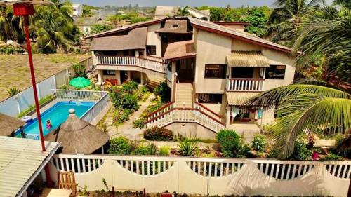 Maison spacieuse à Grand Popo avec piscine partagée 180 m²