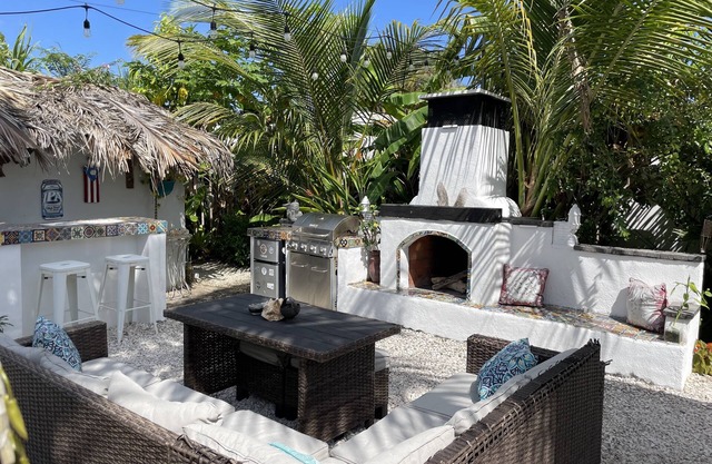 Malecon Beach House with beautiful backyard. Steps from the Caribbean ocean.