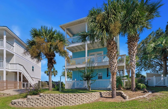 "Mermaid Cove" offers canal views, fenced-in yard, boat parking, pet friendly!
