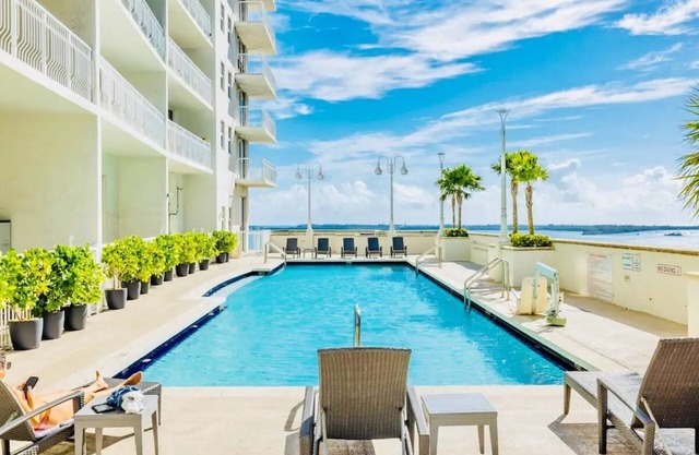Modern 2BR Condo | Skyline Views + Pool & Hot Tub!