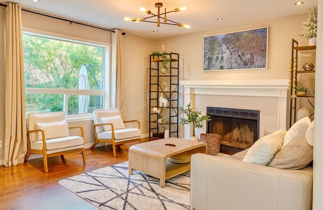 Modern 4BR Home with Garage, Fireplace & Backyard
