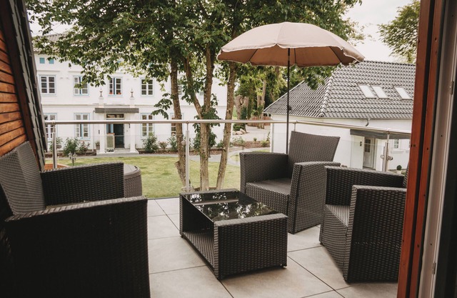Modern apartment own roof terrace quietly located in the historic backyard