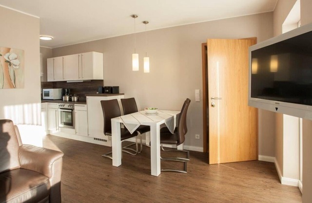 Modern 60sqm apartment with south-facing balcony, free WiFi