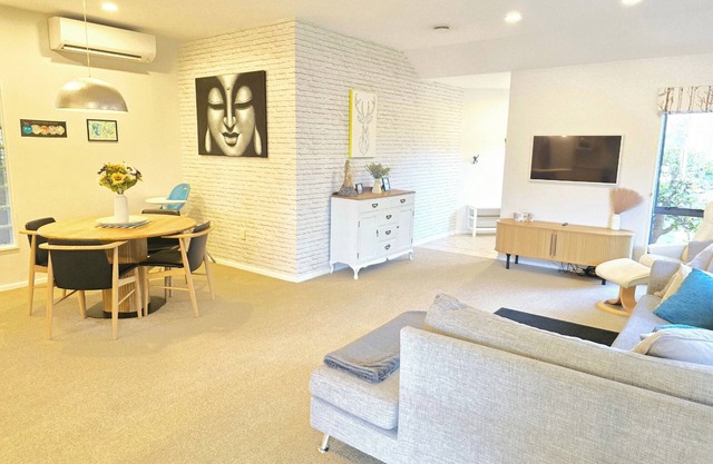Modern Family Oasis in Clive nSpacious fully furnished 3 bdrm home w/AC.
