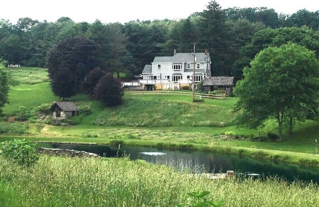 Modern farmhouse located on 53 acres of manicured rolling hills.