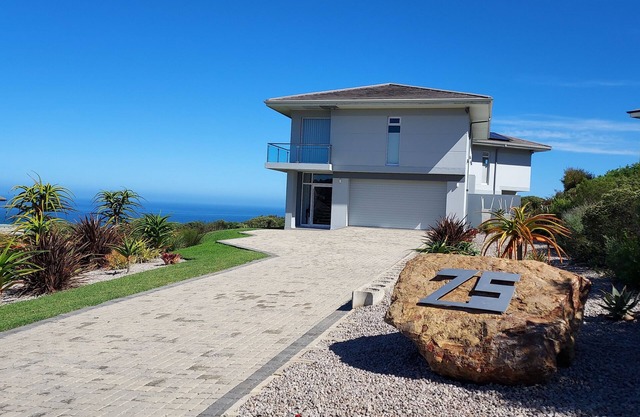 Modern house with a breath-taking 180 degree panoramic view of the Indian Ocean.