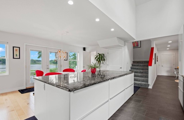 Modern lake house with a double lot. The views are amazing inside and out!n