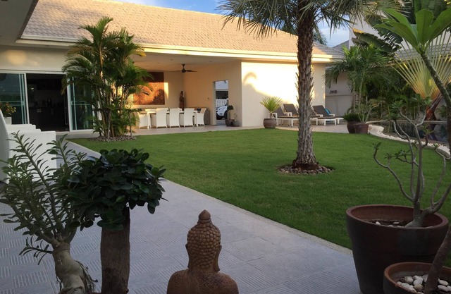 Modern luxury villa with large saltwater pool, jacuzzi and tropical garden