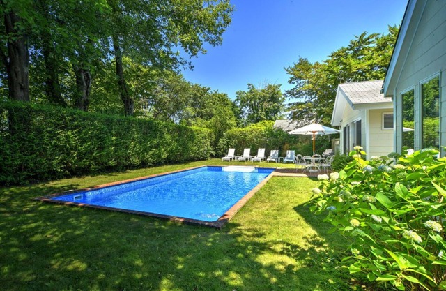 Modern New Kitchen, Heated Pool! Walk to everything in East Hampton Village!