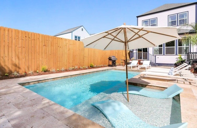 Modern Urban Oasis w/Heated Pool, Patio & Parking