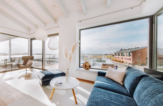 Modern vacation apartment on the Bodden with sun terrace, sauna and fireplace