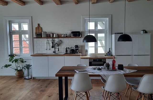 Modern vacation apartment "Tanzsaal" Living in a listed half-timbered house