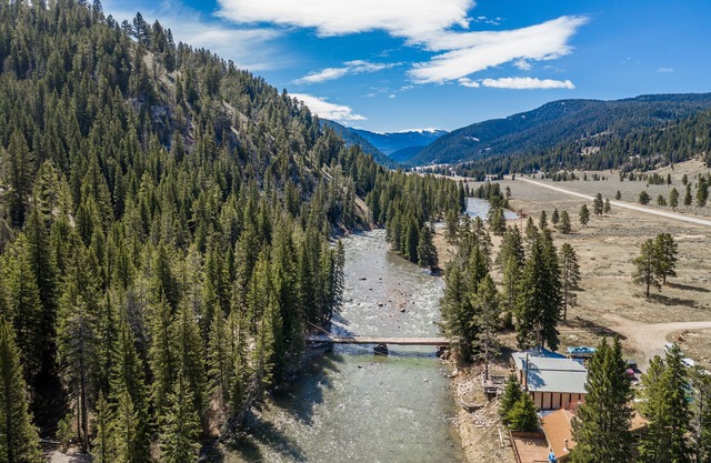 Mountain cabin w/a wood burning stove, large deck, & river views - near hiking