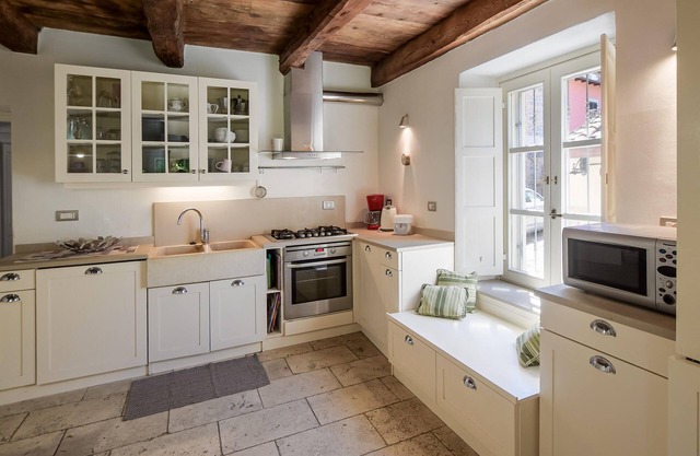 Move into this cozy stone house in the green nature of Tuscany.