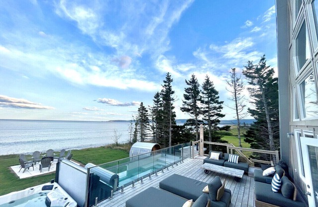 Mystical Beachfront Chalet , Hot tub , Sauna and Heated Container Pool