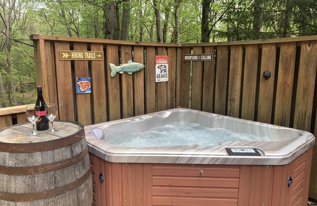 New! Cozy cabin with hot tub and game room.