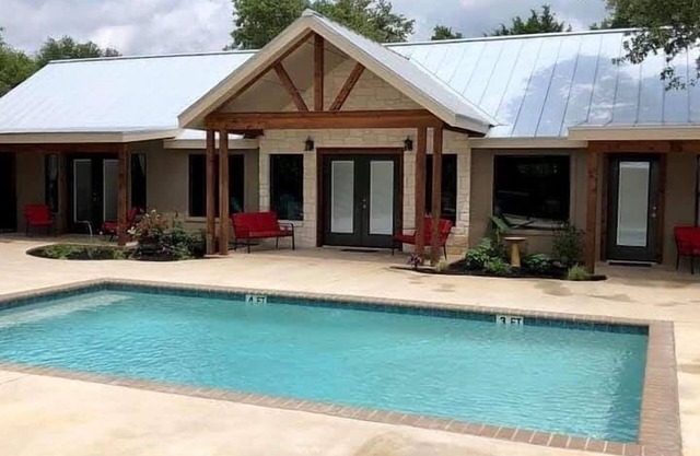 * NEW LISTING* Absolutely stunning home with a pool and all the amenities.