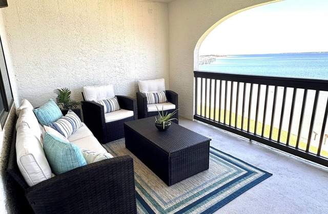 New Listing! Charming Condo with Stunning Water views! Dock, Pool