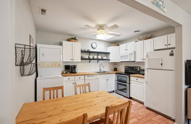 NEW LISTING! Cozy 2BR Condo - Beachside Bliss with Yard Space