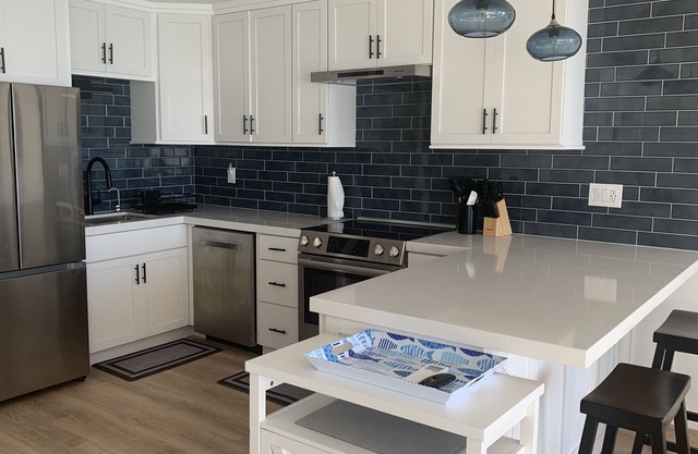 NEW LISTING! REMODELED! Sea and Sand, Stunning Top Floor Oceanfront Condo