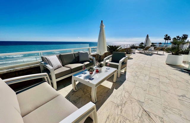 New Listing, Unique apartment beachfront. Large terrace to the sea