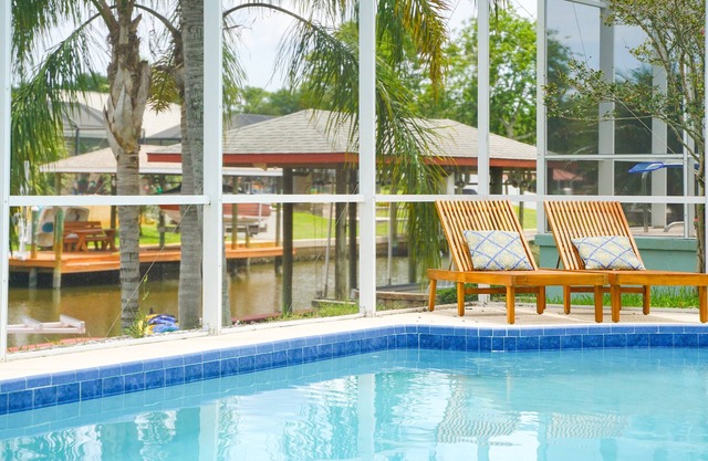 NEW Waterfront Palm Coast Home 12 people Heated Pool Hottub SUP Kayak Boat lift