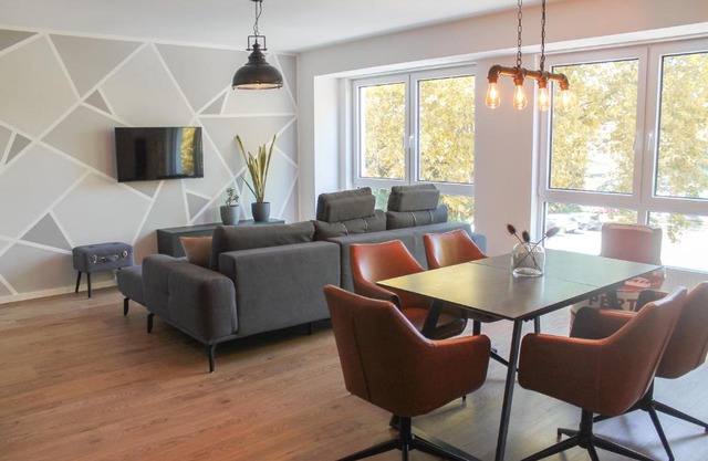New York Apartment - für Freunde & Familien, stadtnah, Parkplatz, E-Ladestation, Gitterbox für Fahrräder, Fitnessstudio, digitale Gästemappe mit Restaurant- und Unternehmenstipps