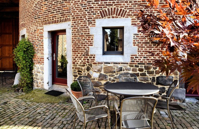Nice apartments in a monumental square farm.