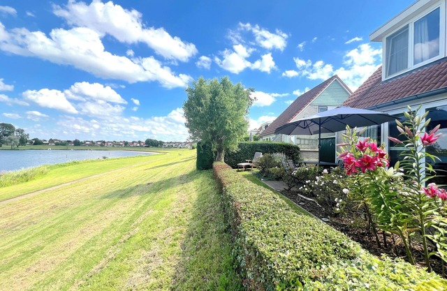 Nice holiday home by the water in Stevensweert