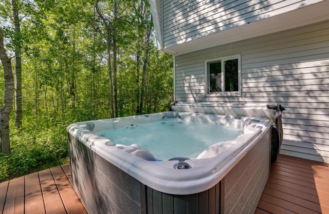 Northern Michigan Hideaway with Hot Tub and Fire Pit!