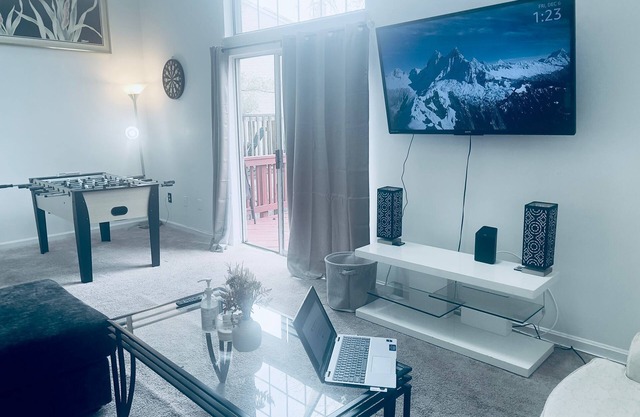 nRoyal Place: Three-Story Townhouse with Balcony & Workspace