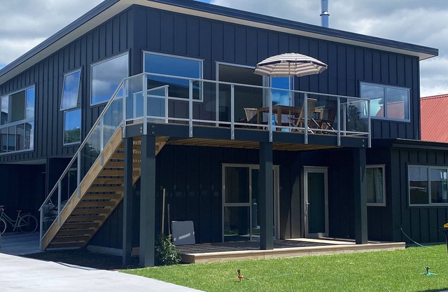 Ocean Bliss Retreat: Modern 4-Bedroom Home Steps from Beach and Shops