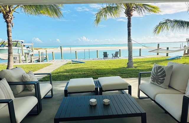 Oceanfront 5-bedroom 3-bath house with 50' Dock & optional 6 seater golf cart