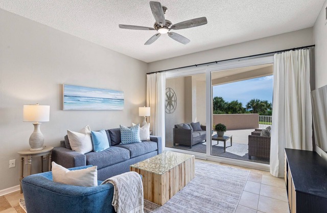 Oceanfront condo with large patio, direct water access, pool, central AC, & W/D