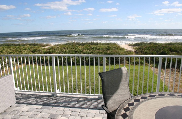 Oceanfront Executive Home with private beach and backyard dunes.