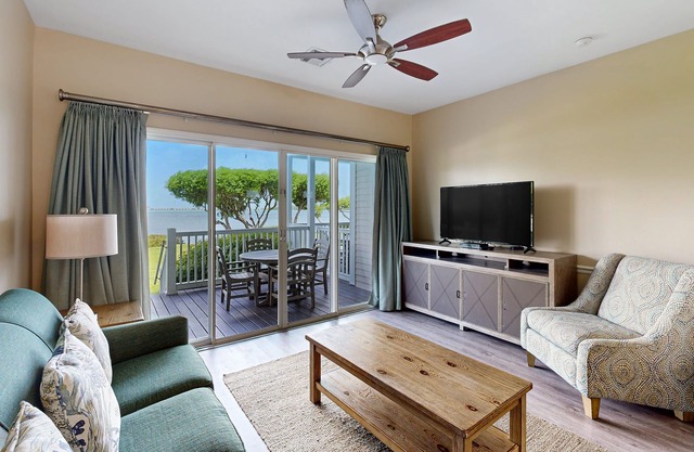 Oceanfront townhouse with a furnished deck, balconies, AC, & washer/dryer