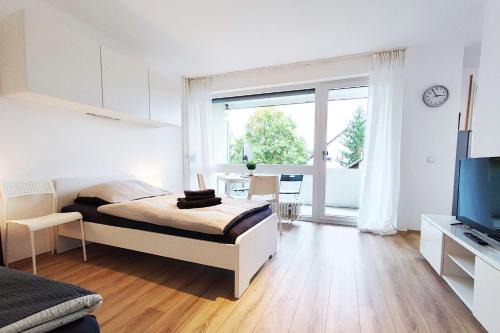 OF14 - Modernes Apartment mit Balkon in Mühlheim