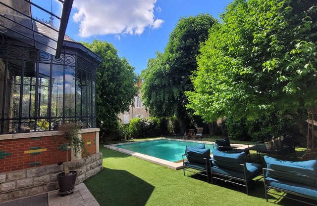 Old house with swimming pool close to town center