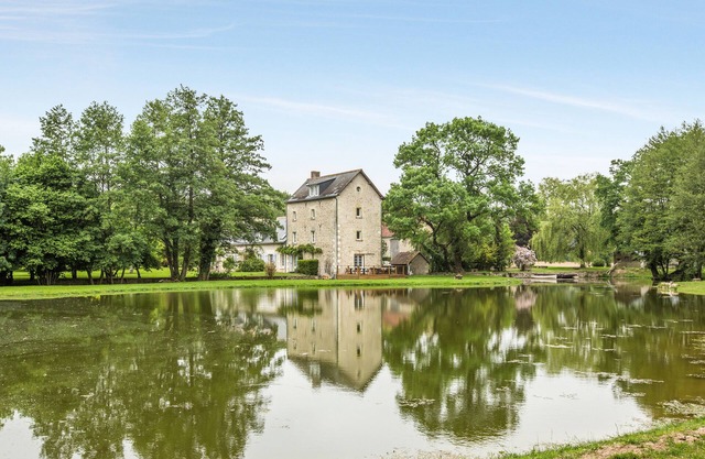 Old mill from the 19th century and its pond in the heart of the Châteaux of the Loire Valley