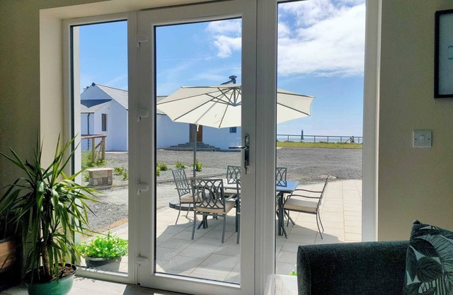 On Cranfield beach modern house sea/mountain views