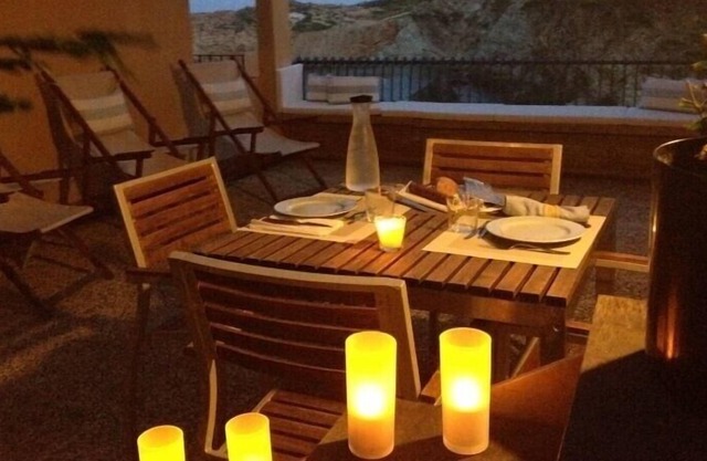 On the beach of Sa Tuna, with spectacular sea views