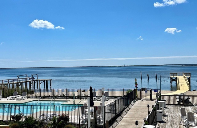 On the picturesque SPT Waterfront! Beautiful Pool & Private Beach!