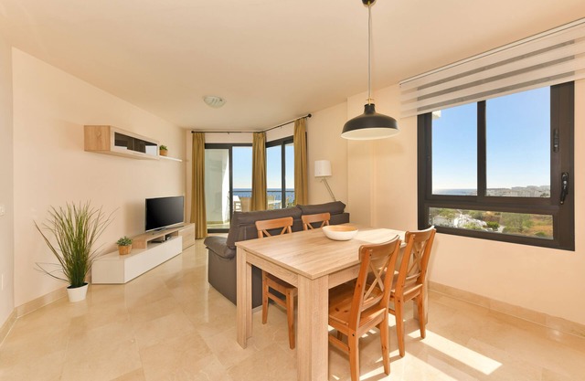 One-Bedroom Apartment with Side Sea View
